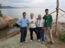 Duffy (second from left) teamed up with Pat Barkey, N9RV (left), for the 2006 World Radiosport Team Championship in Brazil. Here he stands with his host and judge after the contest. [Photo courtesy of Tim Duffy, K3LR]